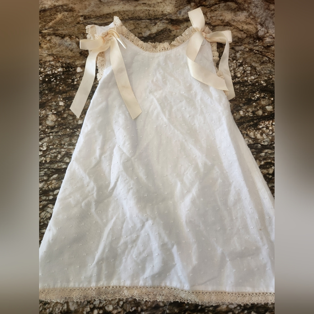 White Sleeveless Dress with Ribbon Details